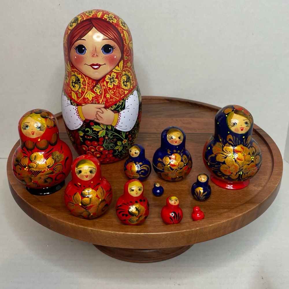Hand-Painted Russian Nesting Dolls. Two Wooden Nesting Doll Sets Of 5. And 1 Tin